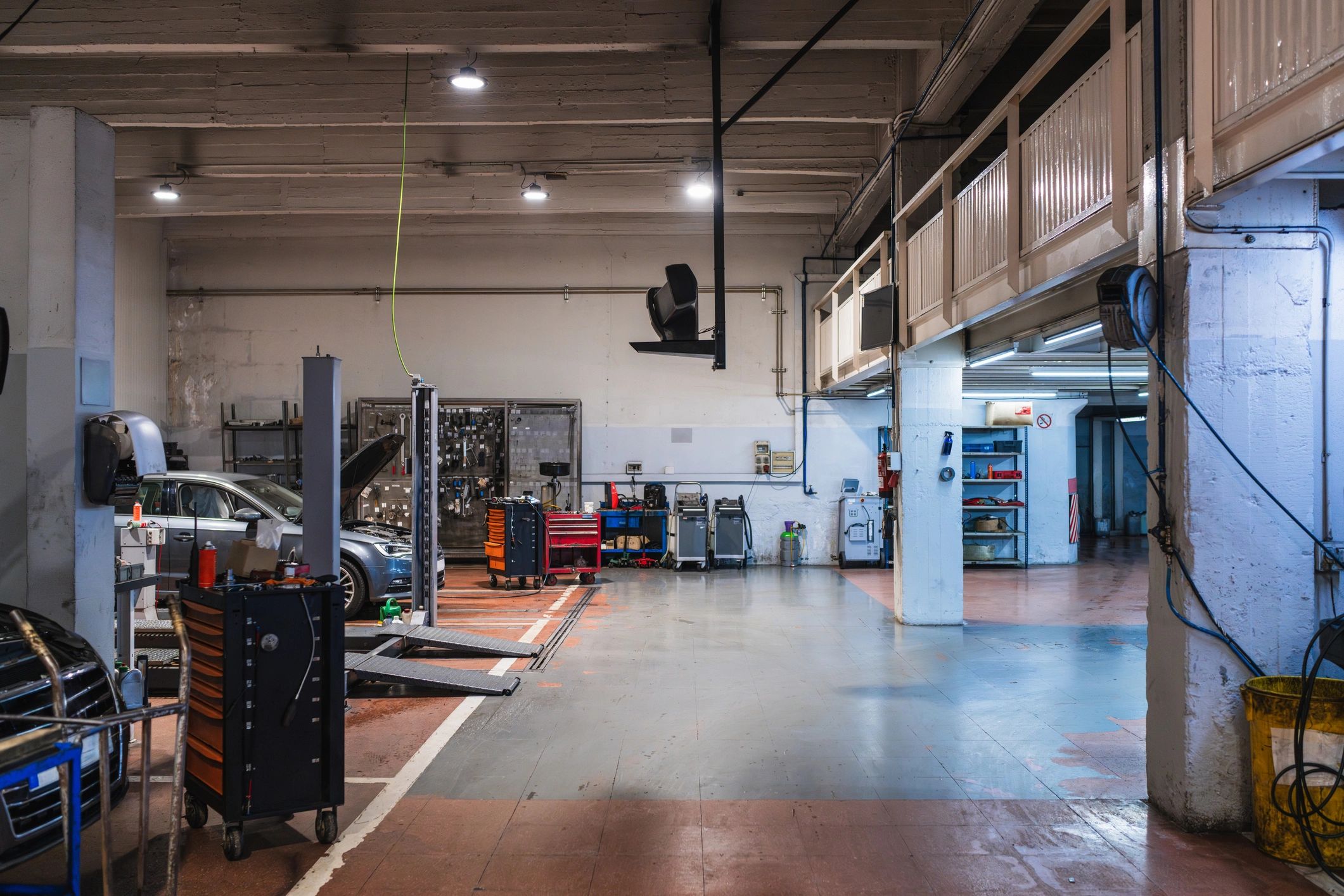 Service bay with vehicle lifts and tools