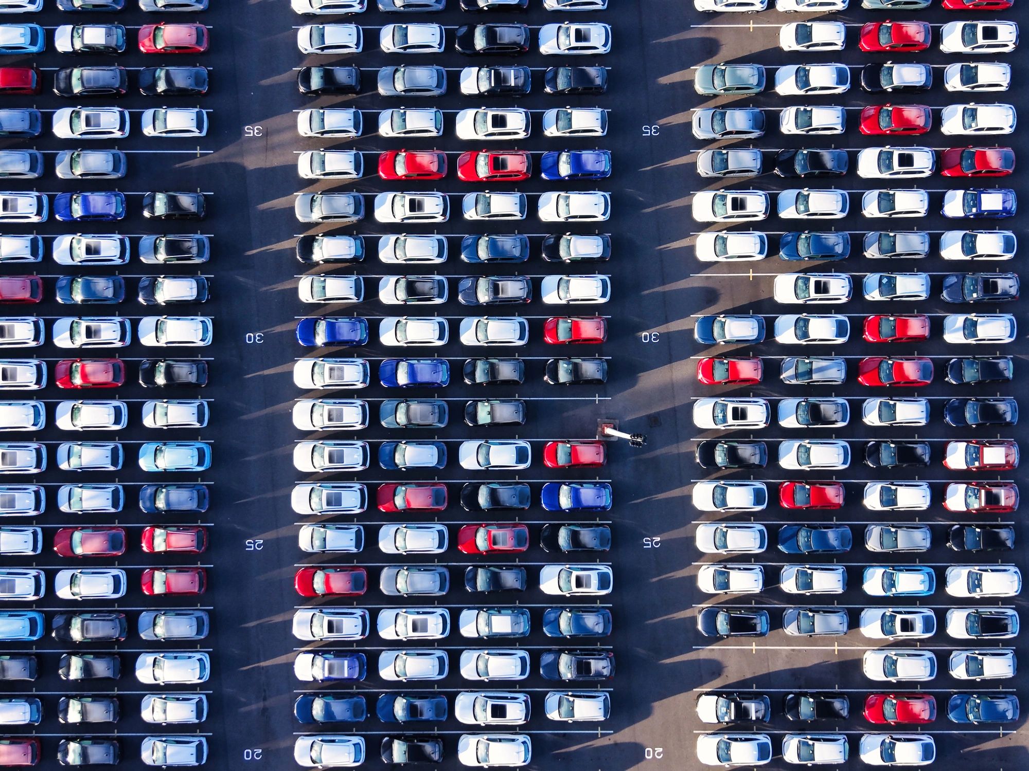 Aerial view of a large car distribution lot
