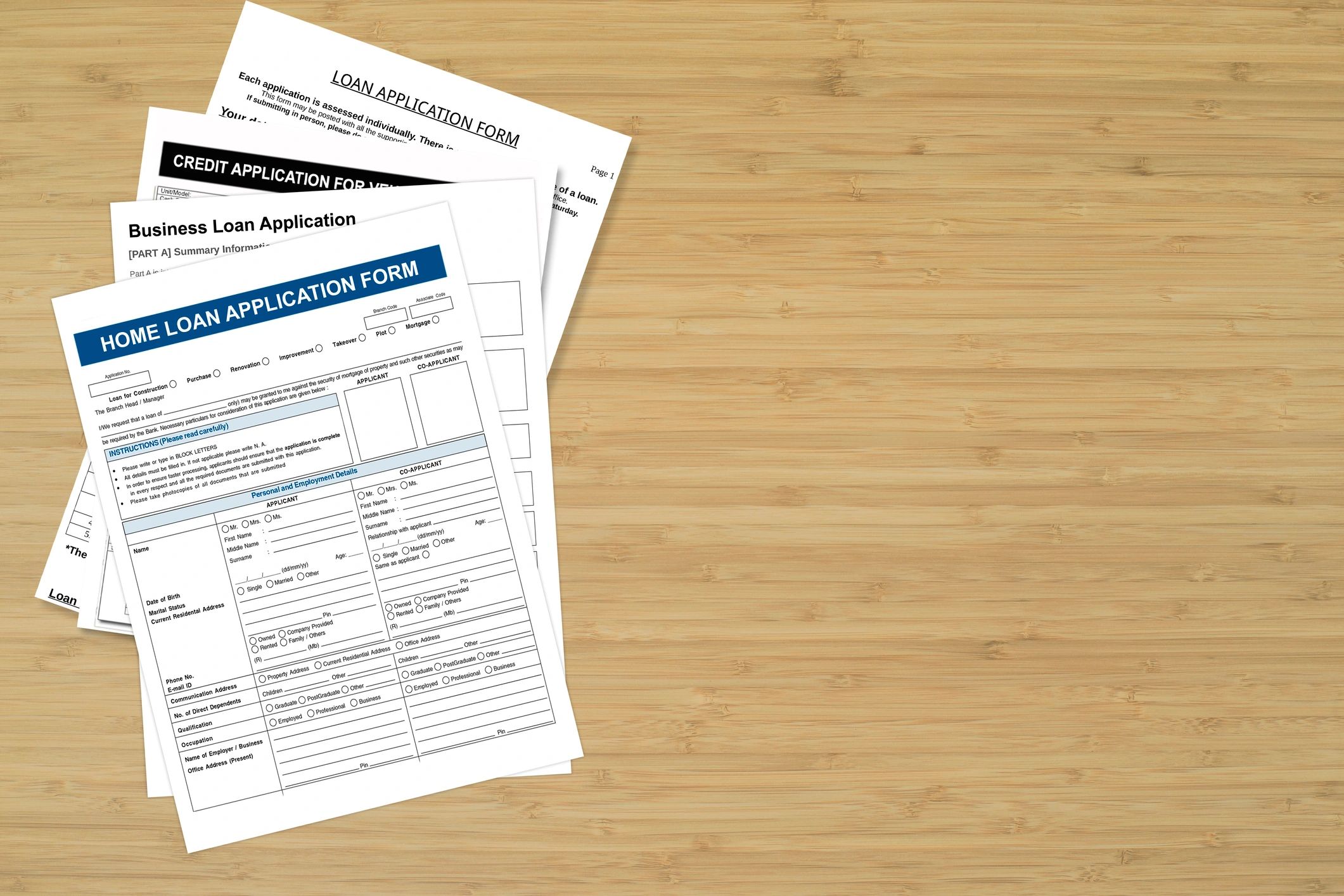 Loan application forms on a desk